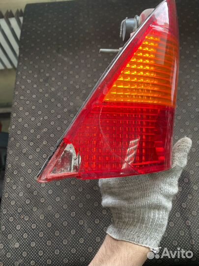 Фонарь задний левый Ford focus 1