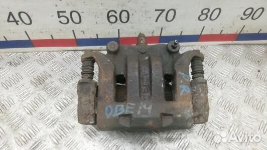 Суппорт тормозной передний правый nissan navara D2