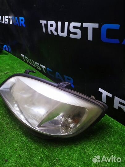 Фара галогеновая передняя левая Opel Zafira