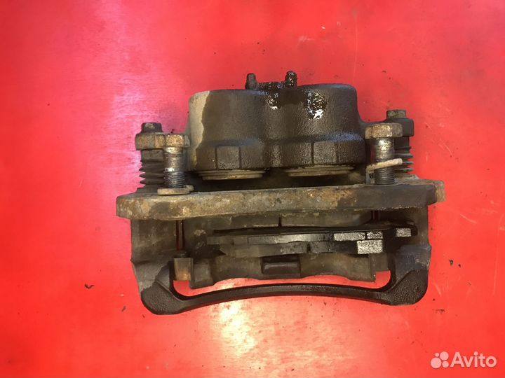 Суппорт тормозной передний левый Ssangyong Kyron