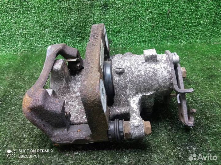 Суппорт задний левый Opel Insignia (2008-2015)