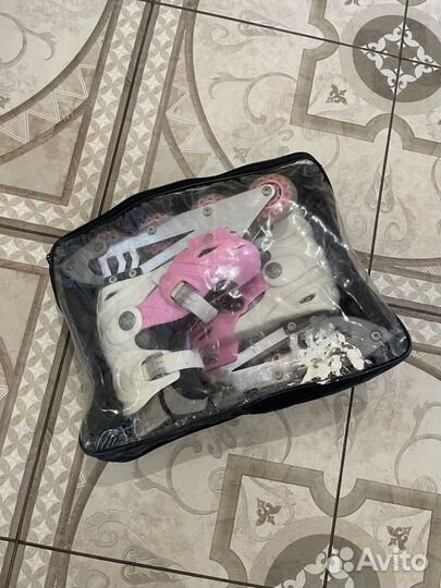 Роликовые коньки