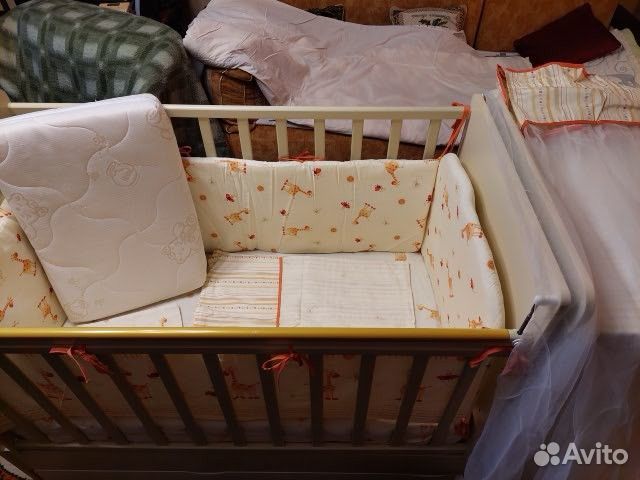 Детская кроватка трансформер с маятником