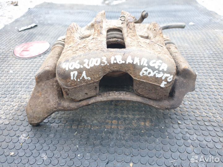 Суппорт тормозной передний левый Peugeot 406 Пежо