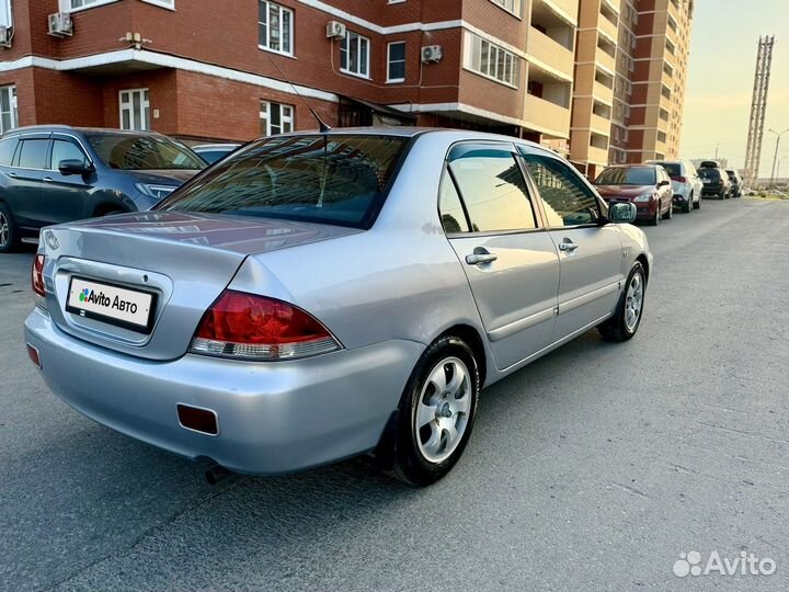 Mitsubishi Lancer 1.6 МТ, 2006, 285 710 км