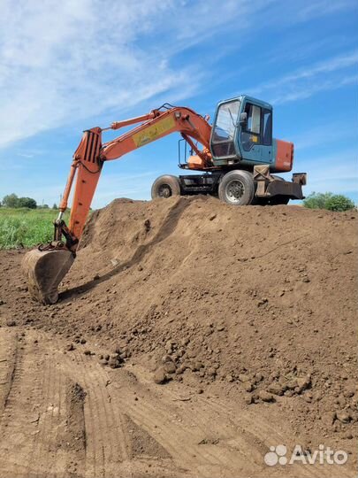 Услуги экскаватора колесного полноповоротного
