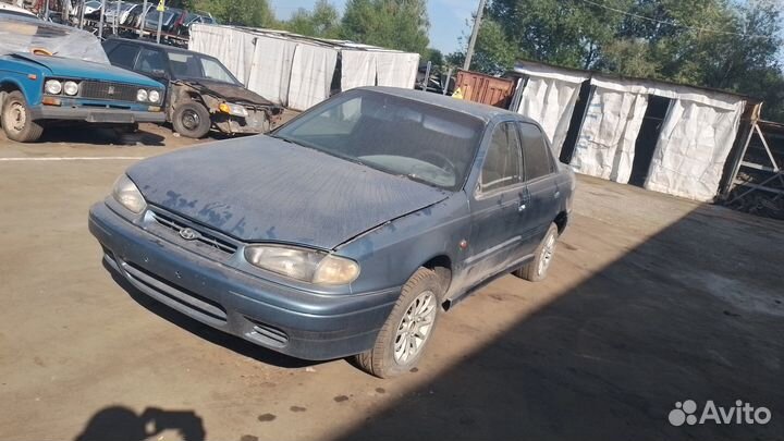 Суппорт правый левый Hyundai Lantra J1