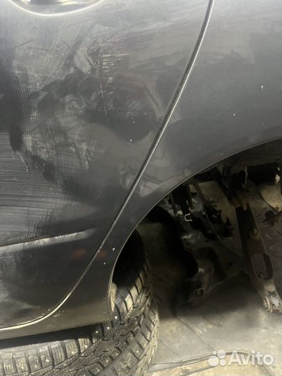 Крыло заднее левое lancer 9