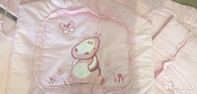 Бортики в детскую кроватку розовые