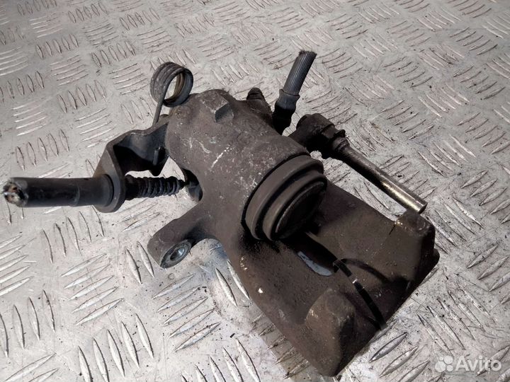 Суппорт задний левый Opel Astra H