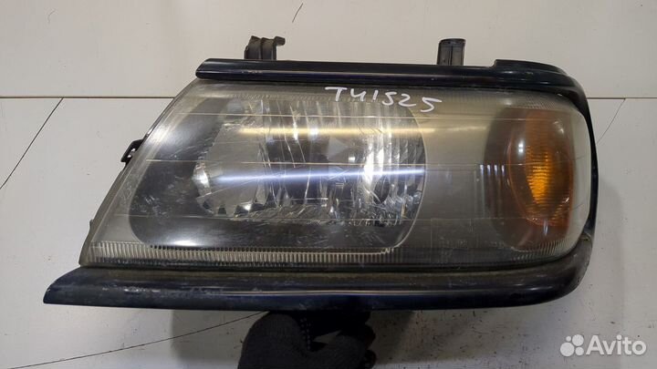 Фара (передняя) Mitsubishi Montero Sport / Pajero