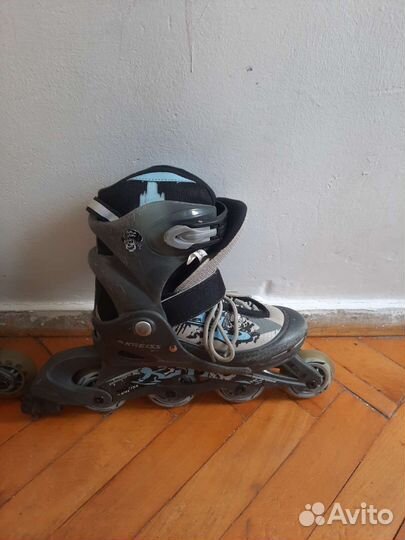 Роликовые коньки