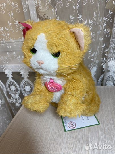 Игрушечная кошка