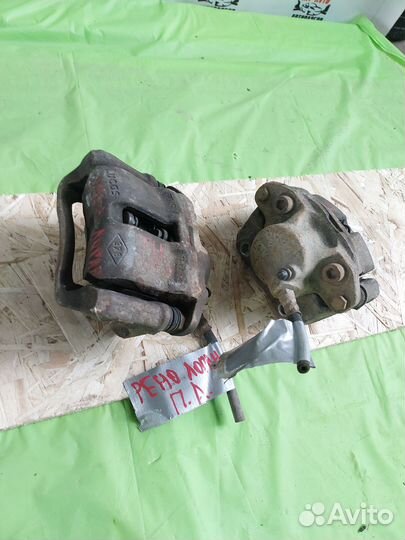 Суппорт тормозной Renault Logan