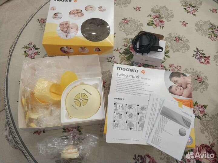 Молокоотсос Medela Swing Maxi + Соска Calma