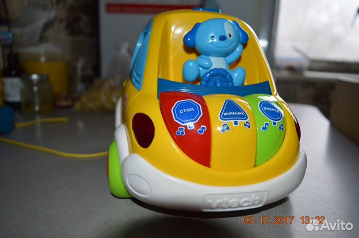 Веселый автомобиль-каталка