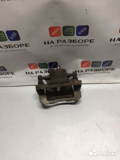 Суппорт передний левый Toyota Corolla E150