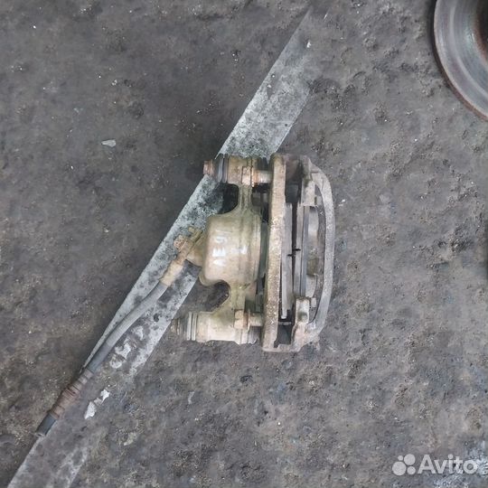 Суппорт тормозной L corolla ae91