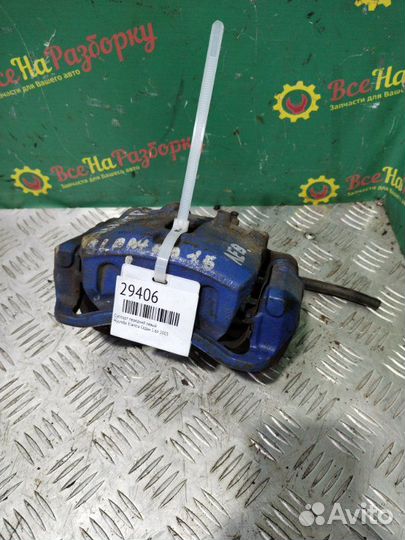 Суппорт передний левый Hyundai Elantra седан 1.6Л