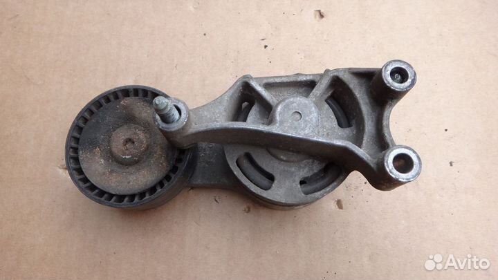 Натяжитель приводного ремня Ауди Фольксваген Шкода