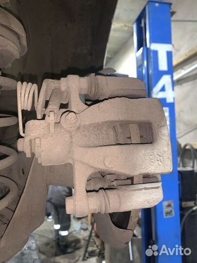 Суппорт задний правый Kia Rio 3 Solaris