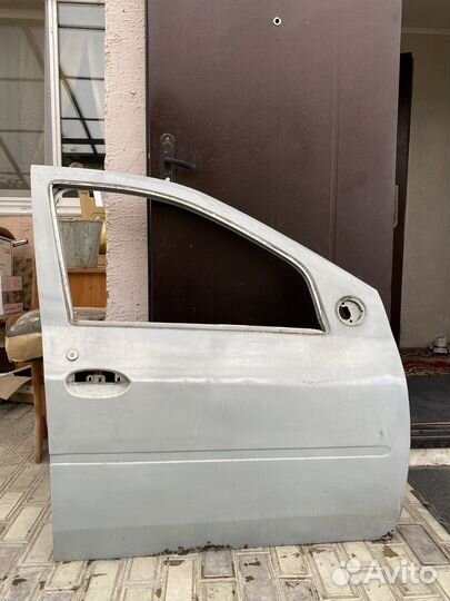 Дверь renault logan