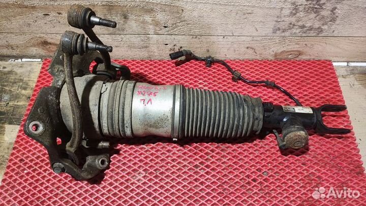 Стойка амортизатора переднего левого Kia Quoris