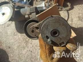 Натяжитель ремня привода генератора