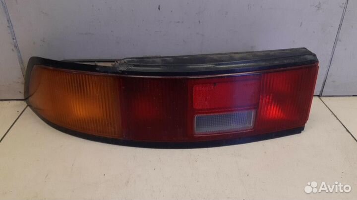 Фонарь левый Mazda 323