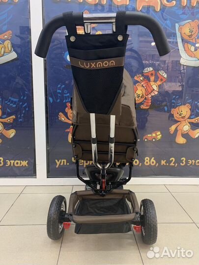 Детский трехколесный велосипед коляска