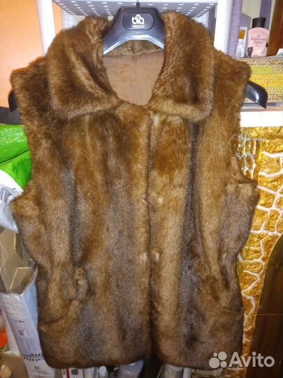 Меховая жилетка