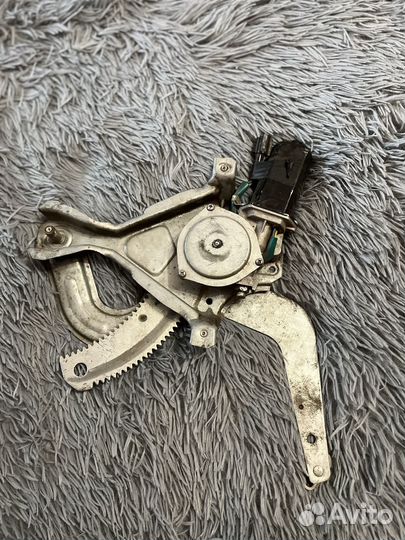 Электро-стеклоподъемник задний левый Daewoo Nexia