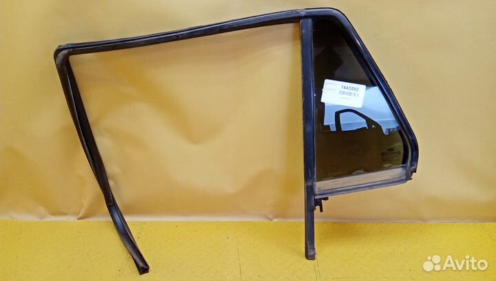 Стекло двери задней левой (форточка) Santa Fe (CM)