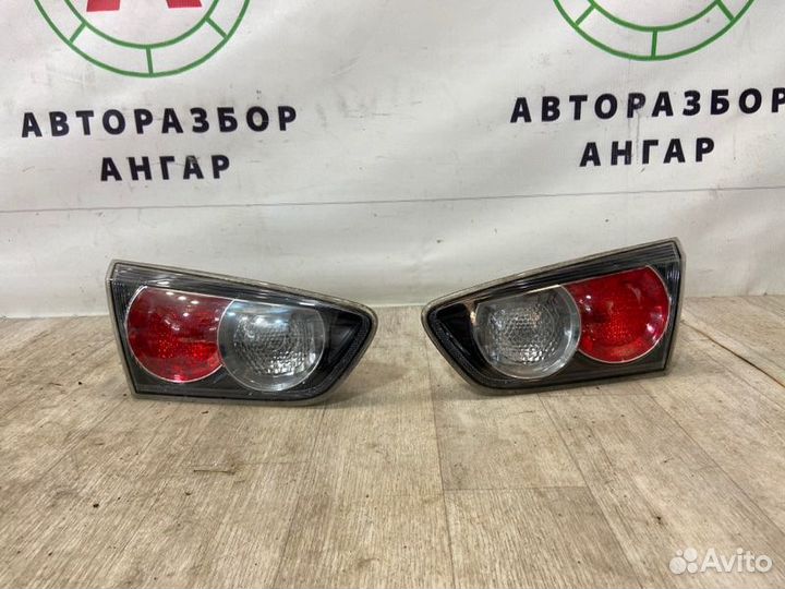 Фонарь в крышку багажника задний Mitsubishi Lancer