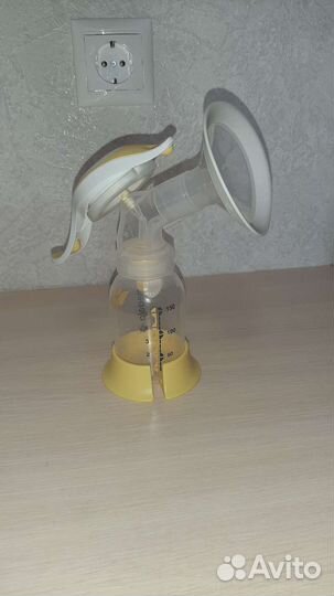Молокоотсос medela ручной
