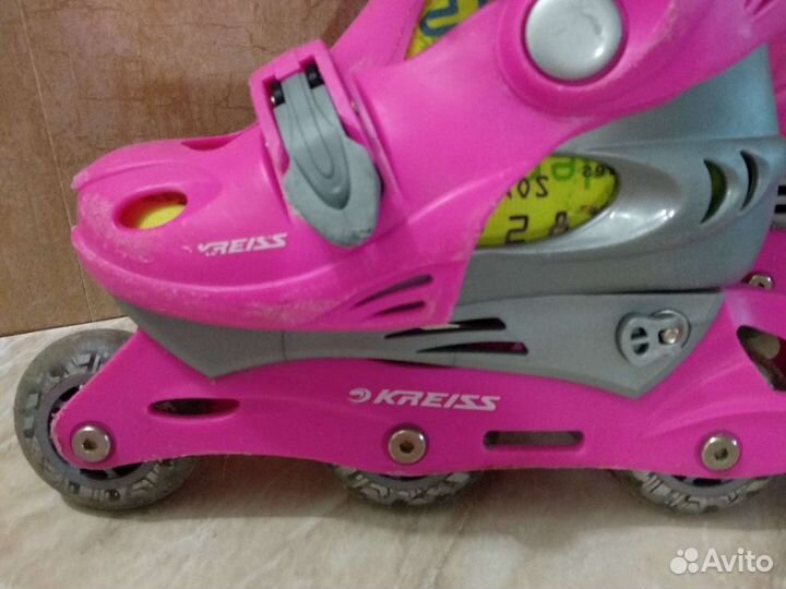 Роликовые коньки