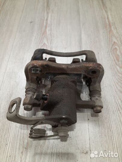 Суппорт тормозной задний Hyundai solaris Лев