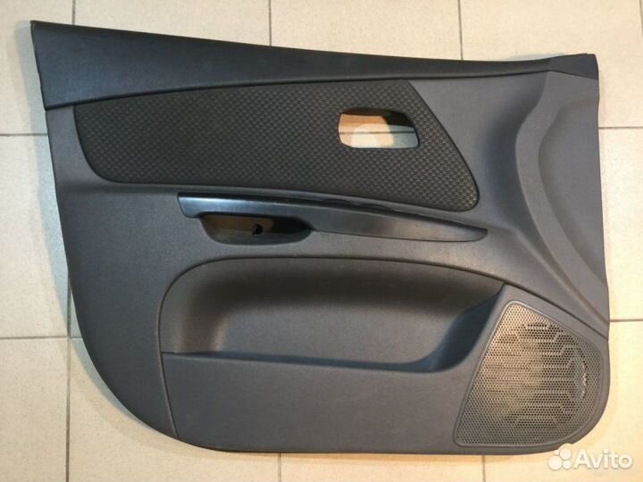 Обшивка двери передней левой Kia Rio 2005-2011