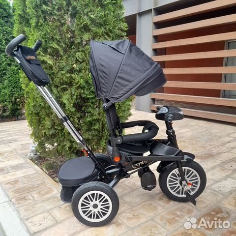 Трехколесный велосипед с ручкой