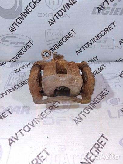 Суппорт тормозной задний левый Hyundai Solaris 1