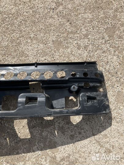 Задний усилитель бампера priora