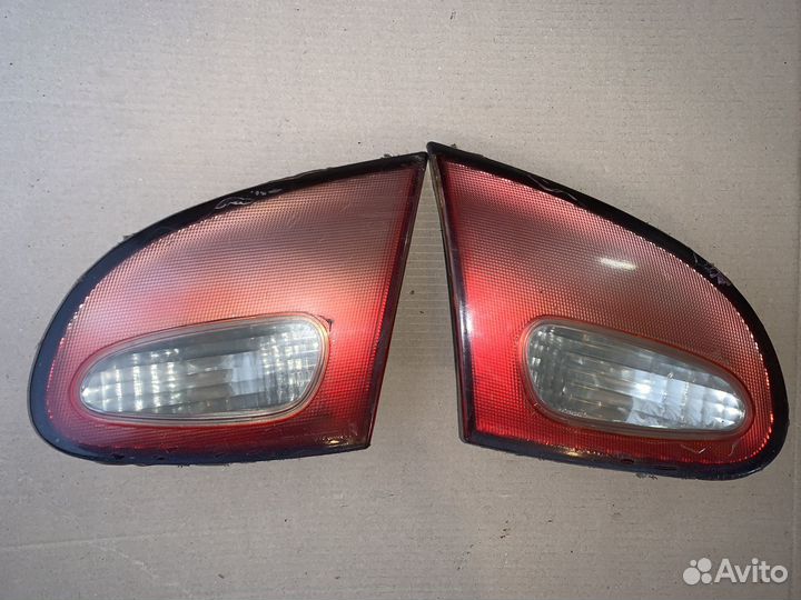 Задний бампер Kia Avella