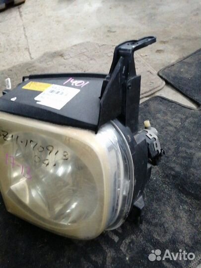 Фара передняя левая Nissan Cube Z11