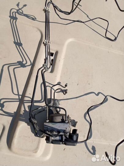 Блок ABS Nissan Note E11