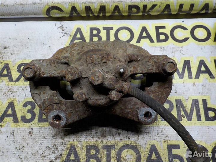 Суппорт передний правый Mitsubishi Lancer 10 (CY)