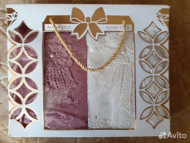 Махровые полотенца и халаты