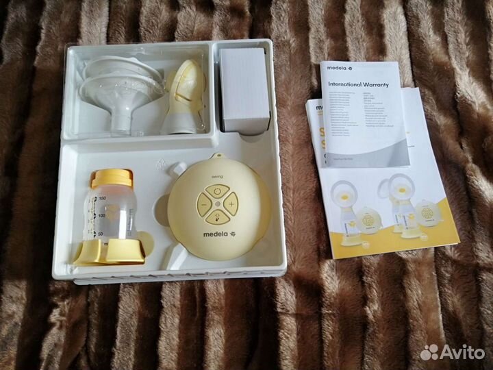 Молокоотсос medela swing flex электрический