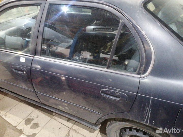Дверь задняя правая Toyota Corolla AE100-aehdk