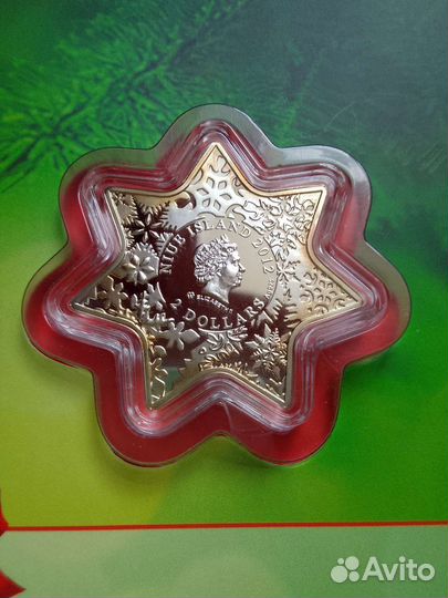 Монета Ниуэ Рождественская звезда серебро