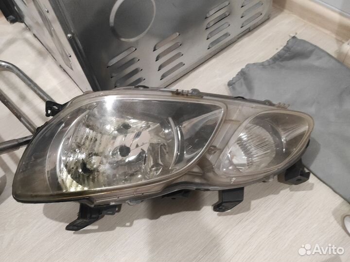 Фара левая на мицубиси аиртрек